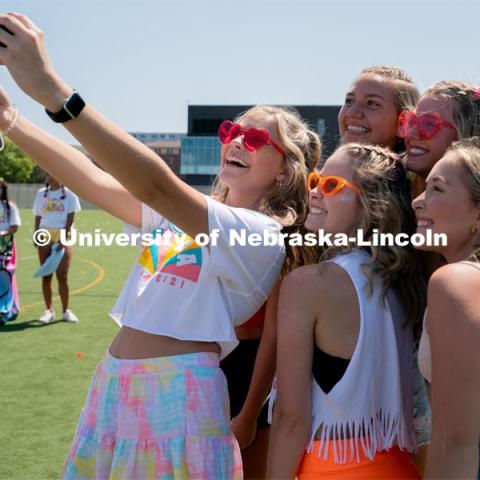 Students pose for photos during Sorority Rush Bid on the Vine Street fields. Sorority bid day recruitment. August 21, 2021. Photo by Jordan Opp / University Communication.